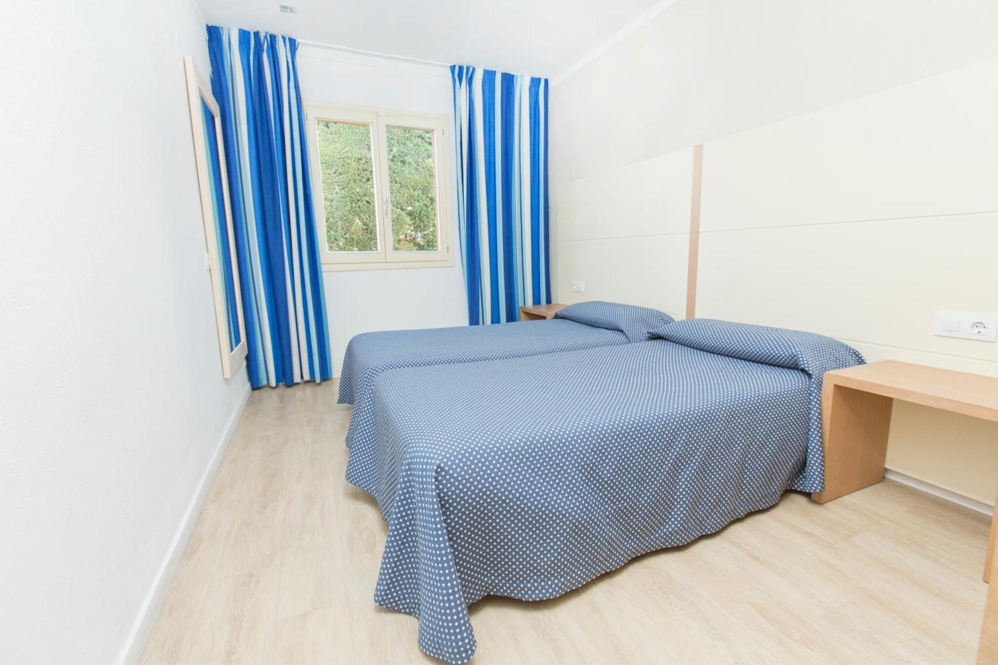 One-Bedroom Apartment (2 Adults + 2 Children)